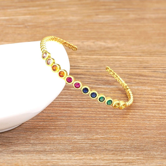 Bratara Claribell, aurie cu pietre multicolore, tip cuff, reglabila - Colectia Boheme