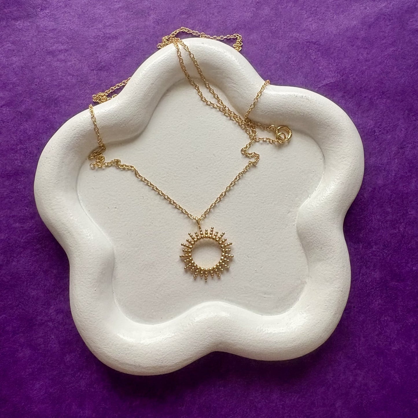 Flora silver necklace, plated with 24K gold, with sun-shaped pendant