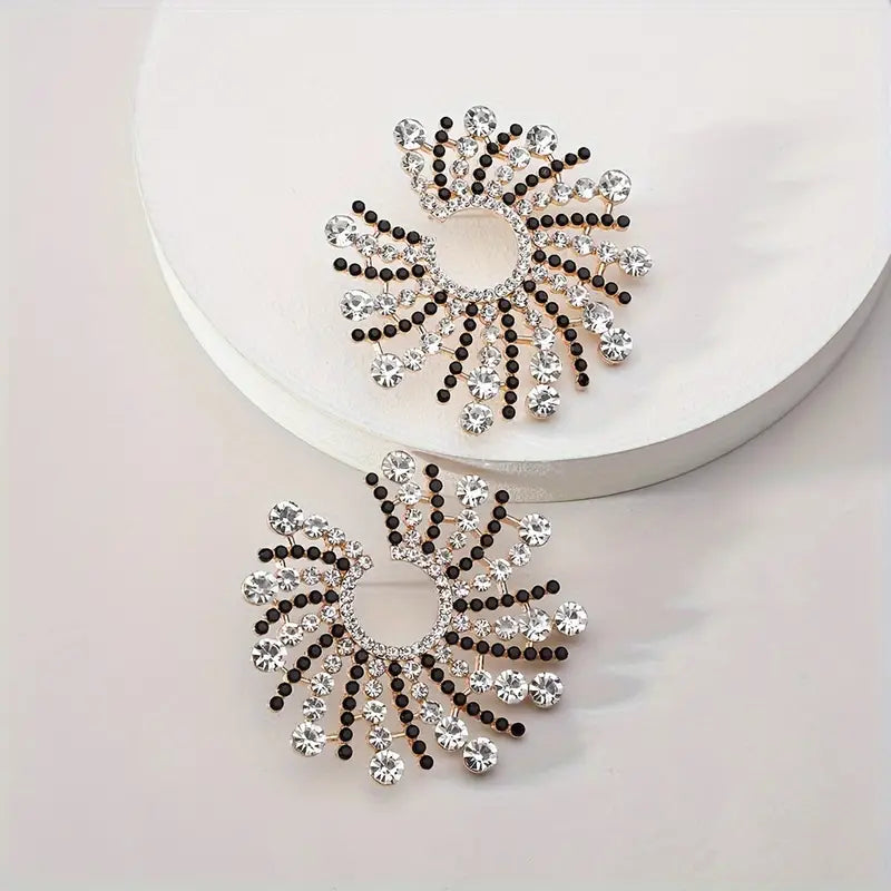 Bitter earrings, round, silver and black mix, decorated with stones