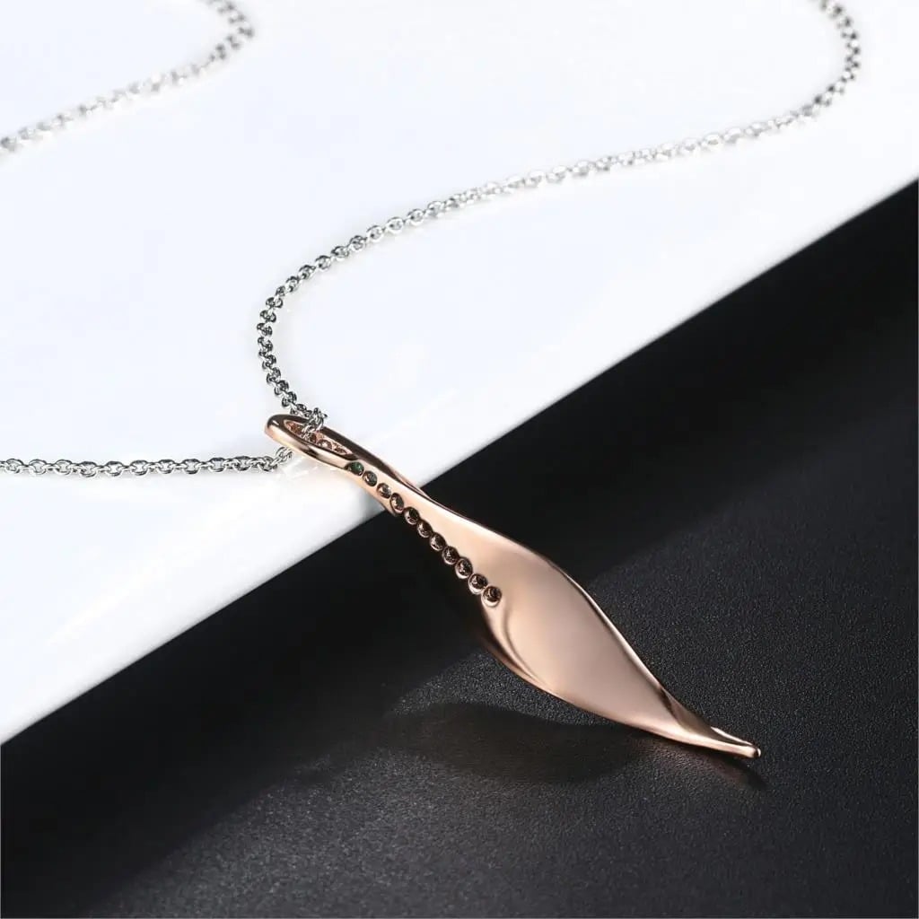 Gala Necklace, rose gold and silver mix, decorated with cubic zirconia and 18K gold plated, with a leaf-shaped pendant